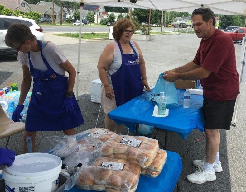 Auxiliary 6027 serves BBQ Chicken meals for Auxiliary Outreach.